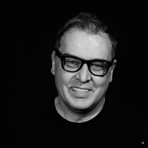 Professional headshot of Andreas Duess